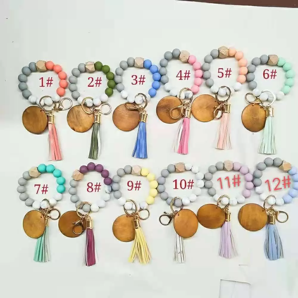 Foreign trade food grade silicone beads wrist keychain PU leather tassel key ring female multi-color optional
Foreign trade food grade silicone beads wrist keychain PU leather tassel key ring female multi-color optional