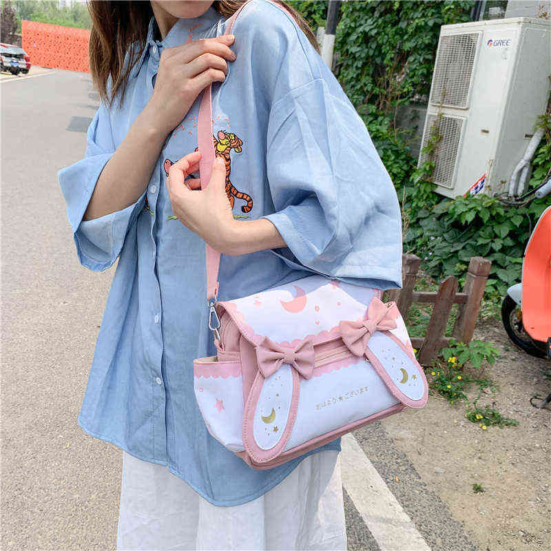Cute Little Fresh Girl School Bag Korean Tote Shopper Bag Soft Girl Sweet Cute Bow Crossbody School Shoulder Messenger Small Bag Y211115
Cute Little Fresh Girl School Bag Korean Tote Shopper Bag Soft Girl Sweet Cute Bow Crossbody School Shoulder Messenger Small Bag Y211115