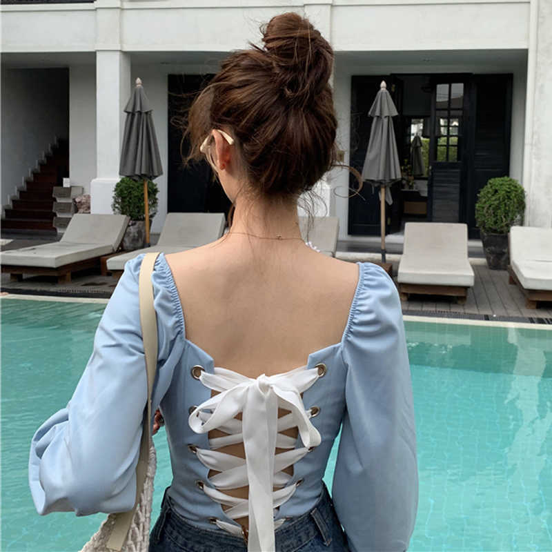 Bohemian Ins Backless Autumn Sexy Slim Long Sleeve Strap Women Casual Fashion Tops Korean Solid Color Vintage Square T-Shirt 210608
Bohemian Ins Backless Autumn Sexy Slim Long Sleeve Strap Women Casual Fashion Tops Korean Solid Color Vintage Square T-Shirt 210608