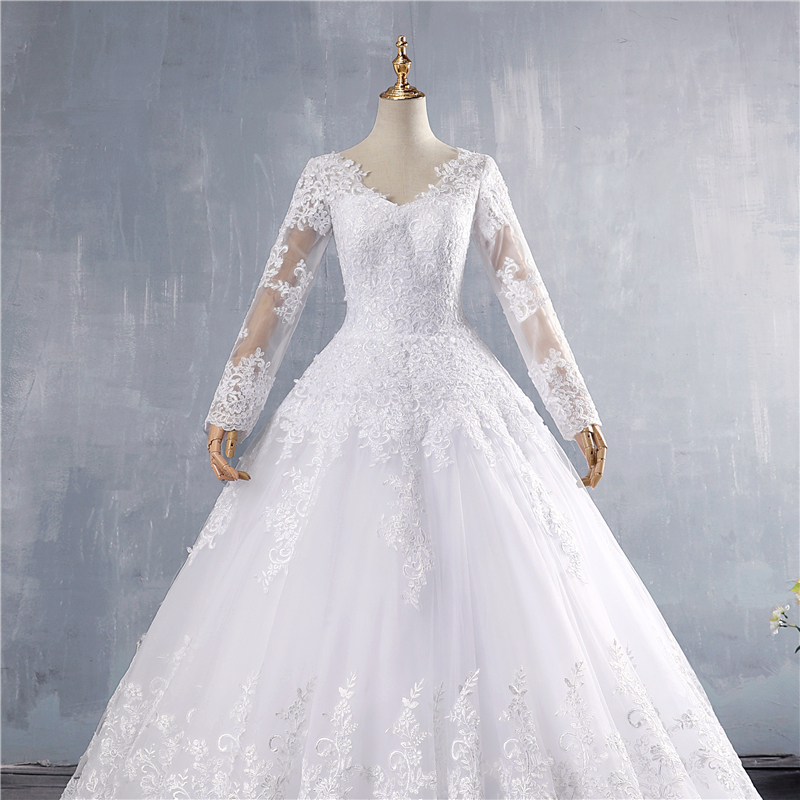 ZJ9160 2021 Dubai Elegant Long Sleeves Ball Gown Wedding Dresses Sheer Crew Neck Lace Appliques Beaded Vestios De Novia Bridal