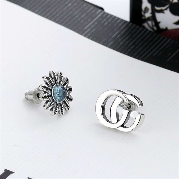 

68% OFF designer jewelry Double g ancient inlaid with Blue Topaz stone flower asymmetric Earrings women's Chrysanthemum Daisy