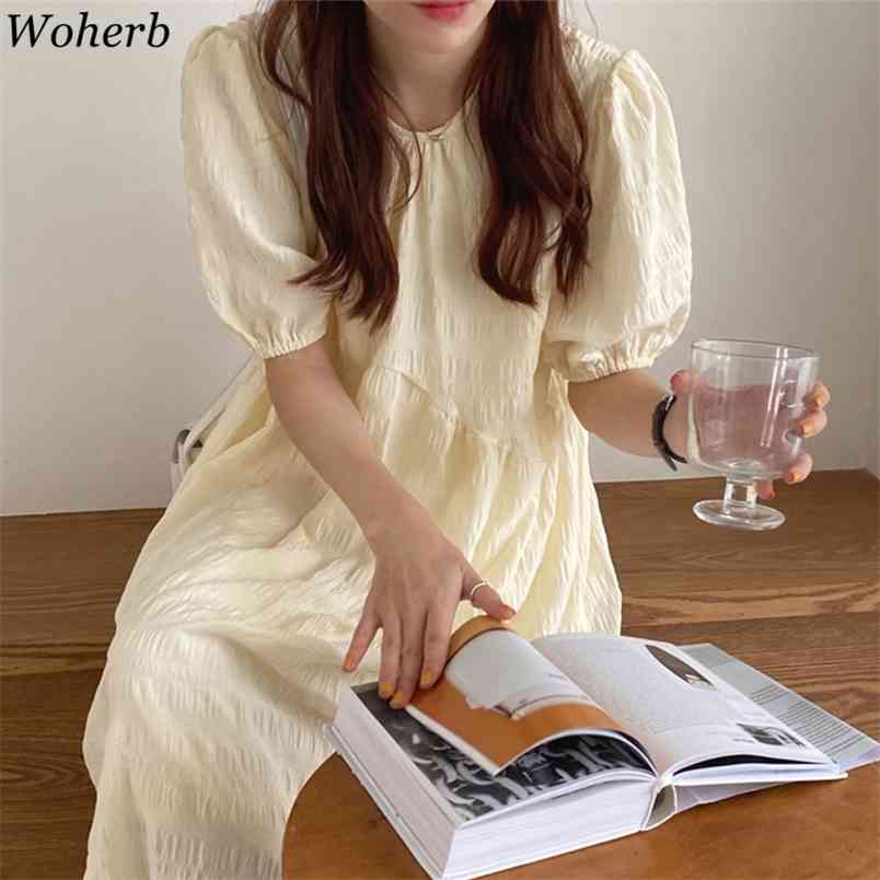 Korean Chic Elegant Solid Dress Women Short Puff Sleeve Vintage Maxi Dresses O-neck Pleated Apricot Robe Summer Vestidos 210519
Korean Chic Elegant Solid Dress Women Short Puff Sleeve Vintage Maxi Dresses O-neck Pleated Apricot Robe Summer Vestidos 210519