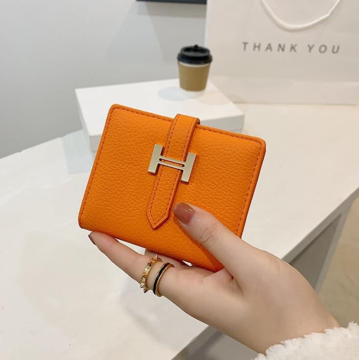 Design Women's New Korean Buckle wallet short version Thin Card holder, Customize
Design Women's New Korean Buckle wallet short version Thin Card holder, Customize