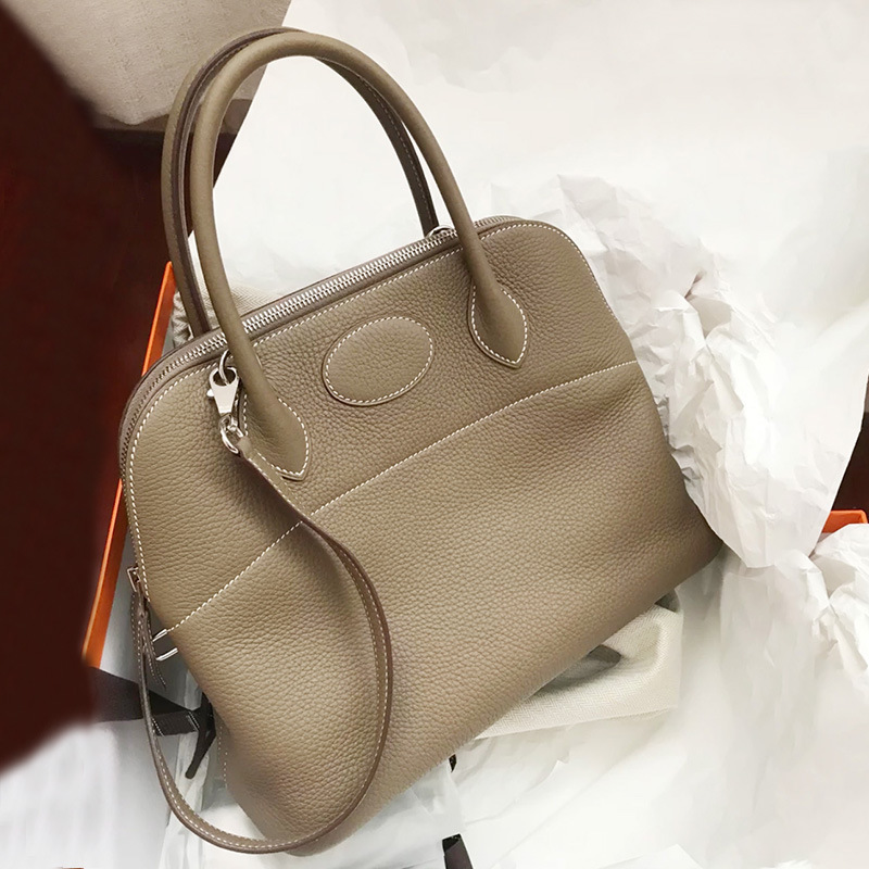 Women Luxurys Designers Bags 2021 style Bowling Baolai Togo lychee grain head layer cow leather p Designer Handbag Handbags Totes Crossbody Bag
Women Luxurys Designers Bags 2021 style Bowling Baolai Togo lychee grain head layer cow leather p Designer Handbag Handbags Totes Crossbody Bag