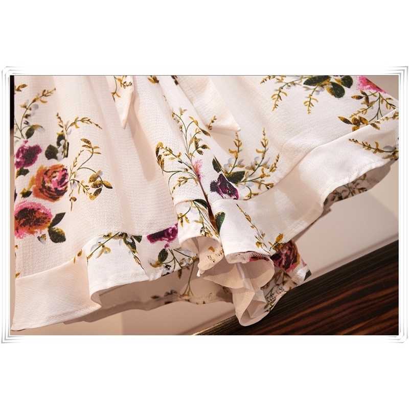 Women Sexy Flare Sleeve Floral Print Rompers Summer V-Neck Belt Beach Short Jumpsuit Casual Female Loose Plus Size Romper L-4XL 210515