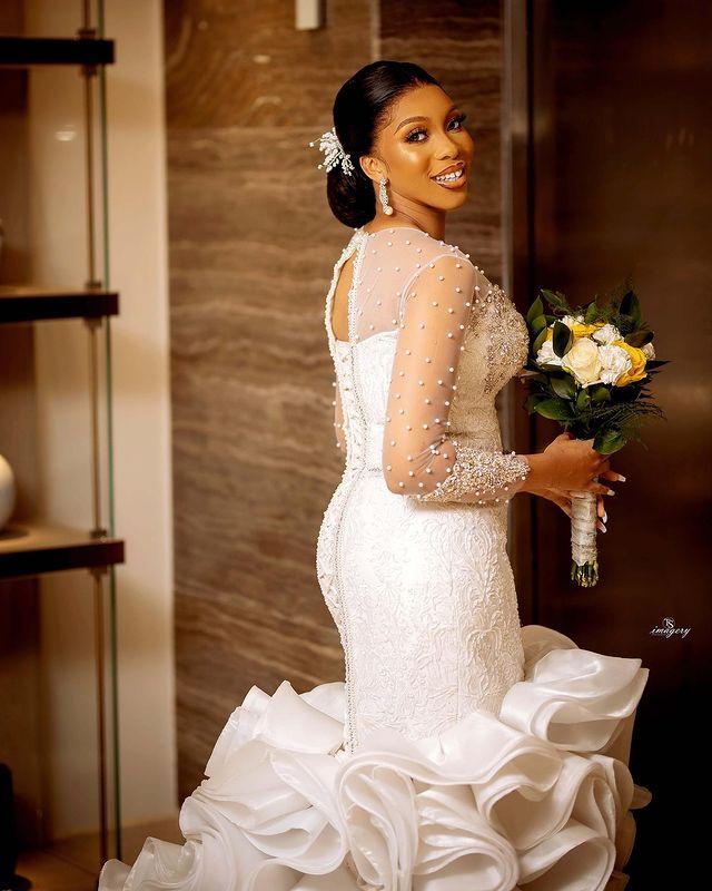 Luxury Pearls Mermaid Wedding Dresses 2022 Illusion Long Sleeve Sheer O-neck Ruffles Wave Cathedral Train African Lace-up Bridal Dress