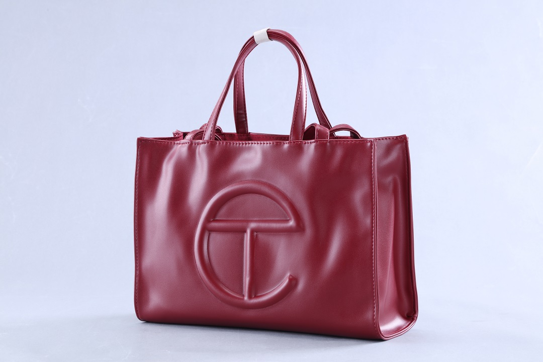 Telfar Shopping Bag Medium Woman Designer Fashion Tote handbags Style Luxury ShoulderGift Pu Leather High Quality wholesale Orange White Lig
Telfar Shopping Bag Medium Woman Designer Fashion Tote handbags Style Luxury ShoulderGift Pu Leather High Quality wholesale Orange White Lig