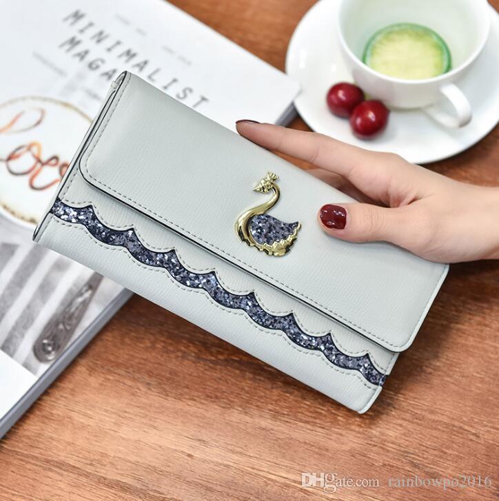 Factory wholesale women bag sweet Swan decoration womens long wallet European and American fan tablets wallets lovely ladies purses, Blue(boutique box)
Factory wholesale women bag sweet Swan decoration womens long wallet European and American fan tablets wallets lovely ladies purses, Blue(boutique box)