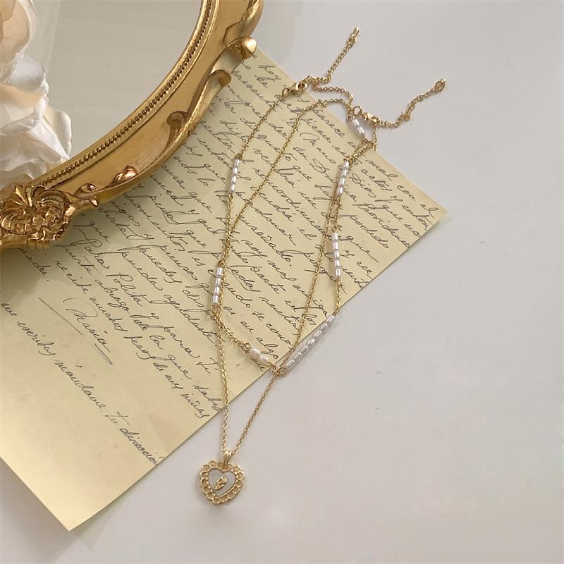 Pendant Necklaces Vintage Elegant Women's Necklace Trendy Personality Temperament Heart-shaped Pearl Double Layer Wholesale, Silver
Pendant Necklaces Vintage Elegant Women's Necklace Trendy Personality Temperament Heart-shaped Pearl Double Layer Wholesale, Silver
