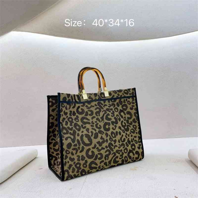 2021 new Korean contrast acrylic canvas leopard print large capacity Tote portable One Shoulder Messenger Bag, Khaki
2021 new Korean contrast acrylic canvas leopard print large capacity Tote portable One Shoulder Messenger Bag, Khaki