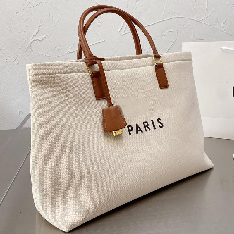 21sss Tote Large Shopping Bag Lady Canvas Handbags Classic Letter Printed Handle Golden Padlock Hardware with Top Quality, 41*28cm 
21sss Tote Large Shopping Bag Lady Canvas Handbags Classic Letter Printed Handle Golden Padlock Hardware with Top Quality, 41*28cm