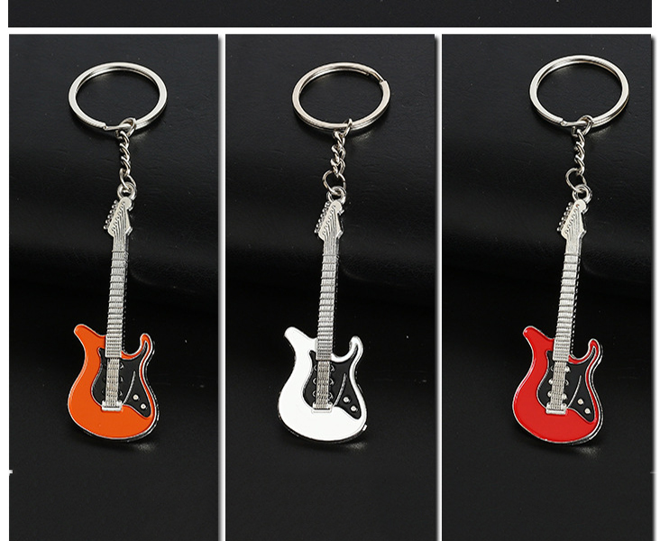 New fashion Guitar Keychains Metal 6 colour Keychain Cute Musical Car Key Ring Silver Color pendant For Man Women Party Gift
New fashion Guitar Keychains Metal 6 colour Keychain Cute Musical Car Key Ring Silver Color pendant For Man Women Party Gift