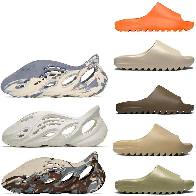 Kanye West Slide Clog Slipper Sandal Foam Runner Black MXT Moon Grey Slipper Women Mens Tainers bone 450 Designer Beach Sandals Slip-on Shoes
Kanye West Slide Clog Slipper Sandal Foam Runner Black MXT Moon Grey Slipper Women Mens Tainers bone 450 Designer Beach Sandals Slip-on Shoes