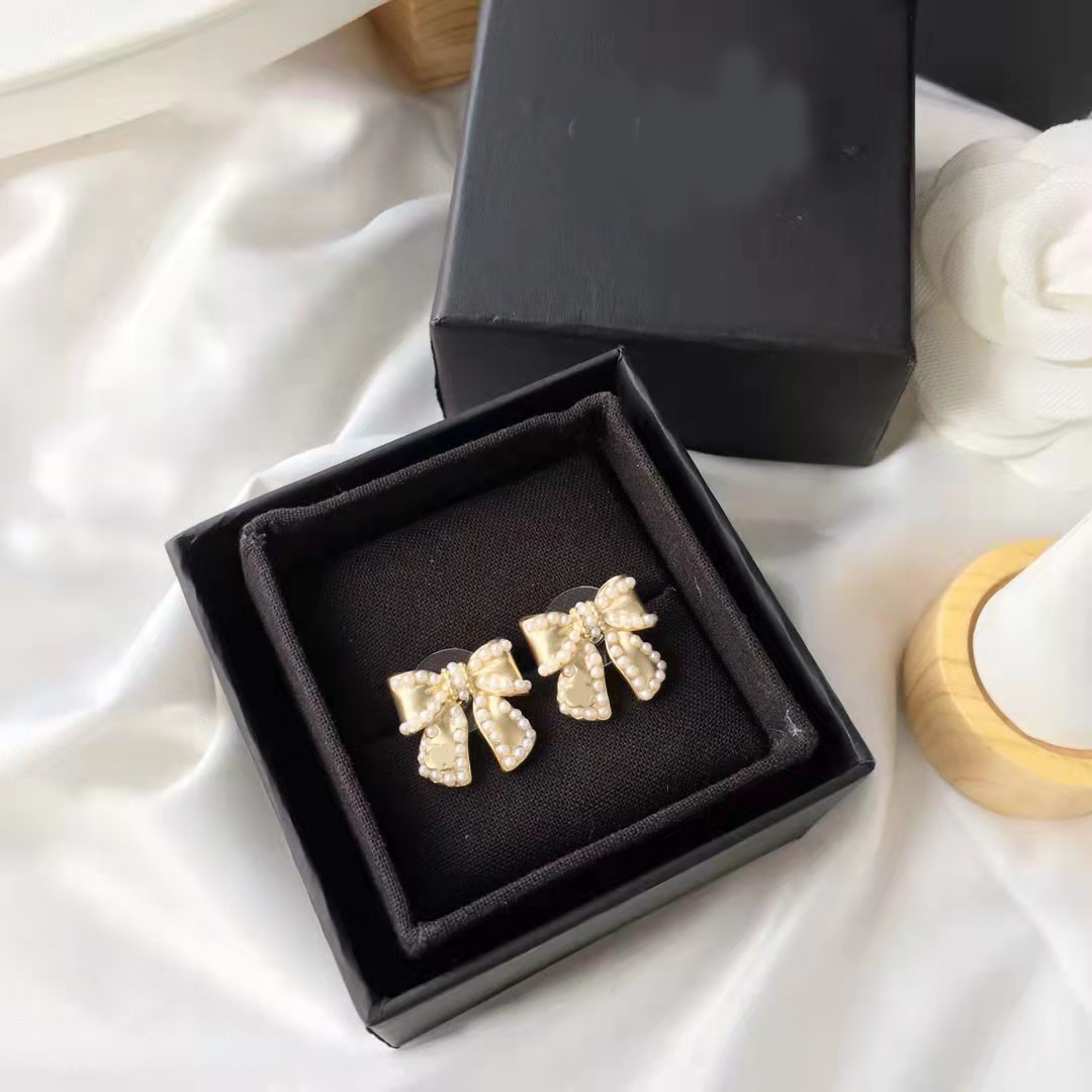 2021 new fashion Knot pearl bow earrings ladies 925 silver needles simple all-match jewelry