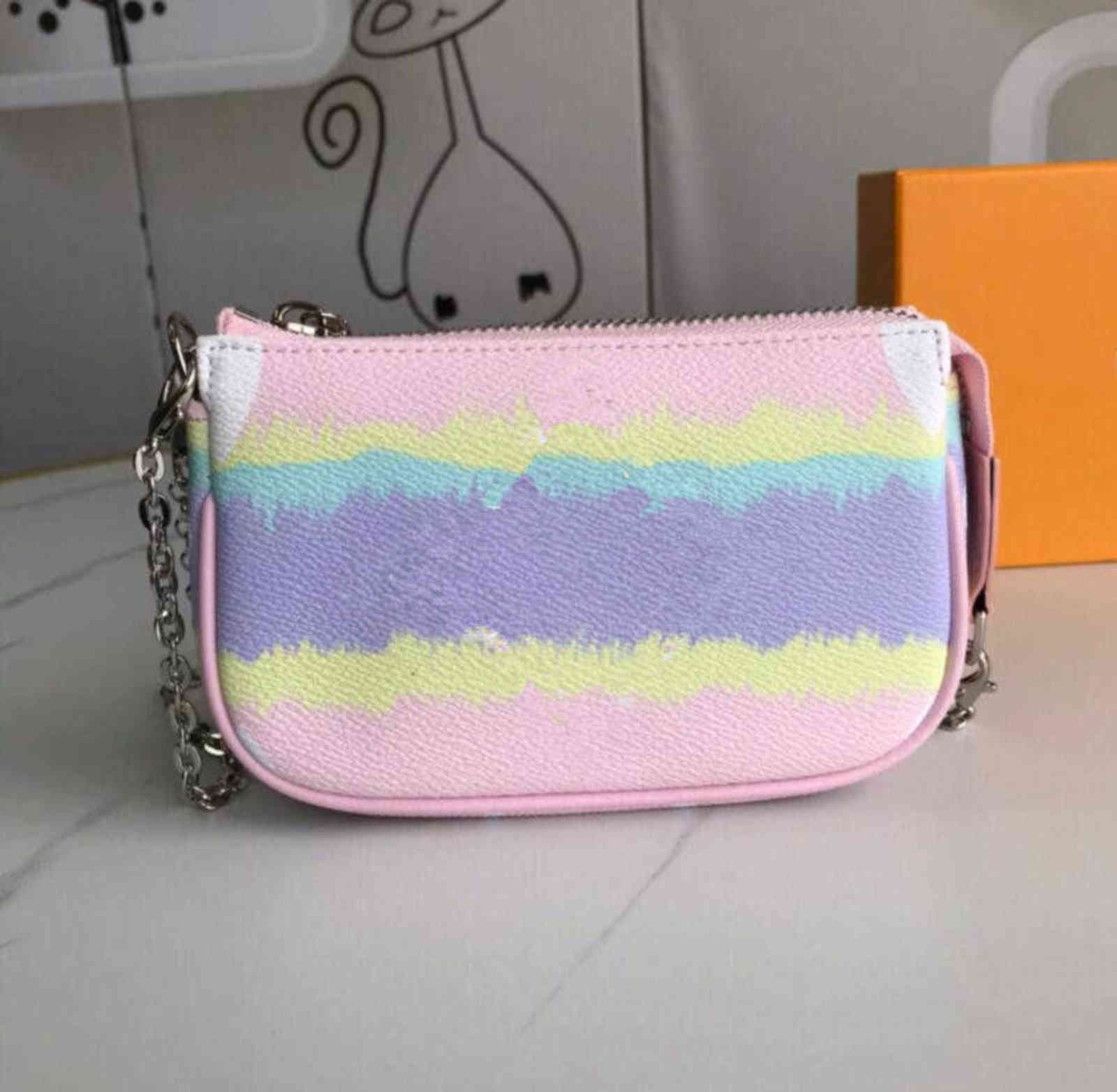 ESCALE Women Luxurys Designers Bags POCHETTE ACCESSOIRES M69269 Women Mini Designer Clutch Hobos Bag with Chain New Tie Dye Giant Series, Red
ESCALE Women Luxurys Designers Bags POCHETTE ACCESSOIRES M69269 Women Mini Designer Clutch Hobos Bag with Chain New Tie Dye Giant Series, Red