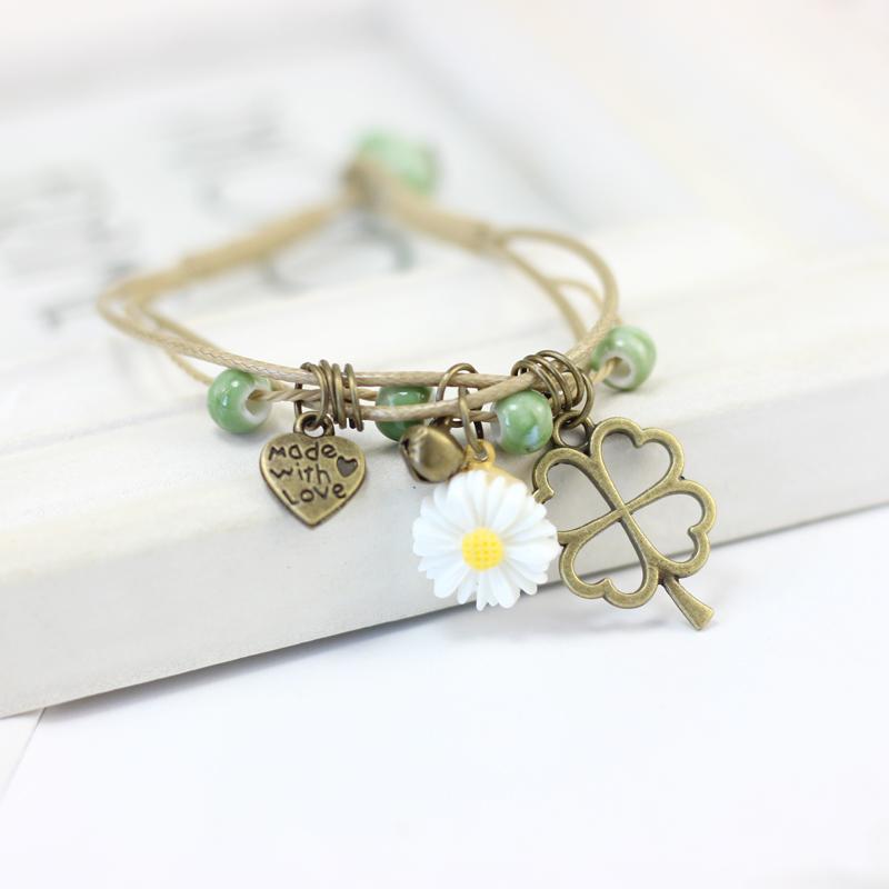 Charm Bracelets Ceramic Flower And Alloy Leaf Multi-layer Rope Women Handmade Small Daisy Iron Tower Pendant Bracelet Gift
Charm Bracelets Ceramic Flower And Alloy Leaf Multi-layer Rope Women Handmade Small Daisy Iron Tower Pendant Bracelet Gift