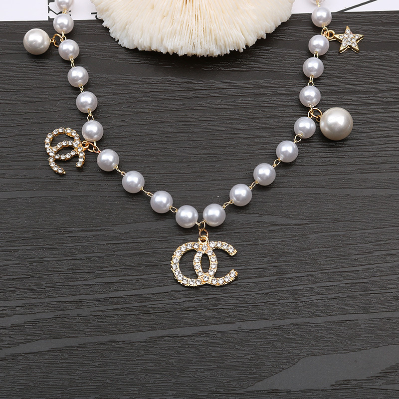 Autumn fragrance pearl necklace Diamond Star Pendant sweater chain fashion lady model, Silver
Autumn fragrance pearl necklace Diamond Star Pendant sweater chain fashion lady model, Silver