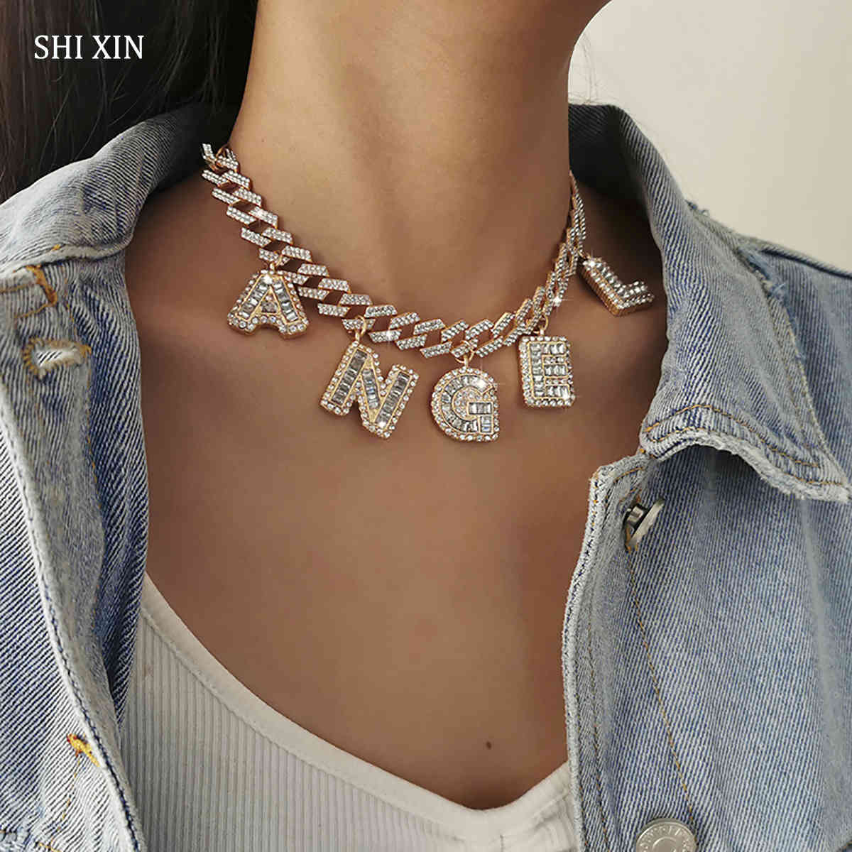 SHIXIN Chunky Iced Out Chain Rhinestone Choker Necklace With Angel Letter Prndnat Necklace for Women Thick Cuban Link Chain 2021 X0509
SHIXIN Chunky Iced Out Chain Rhinestone Choker Necklace With Angel Letter Prndnat Necklace for Women Thick Cuban Link Chain 2021 X0509