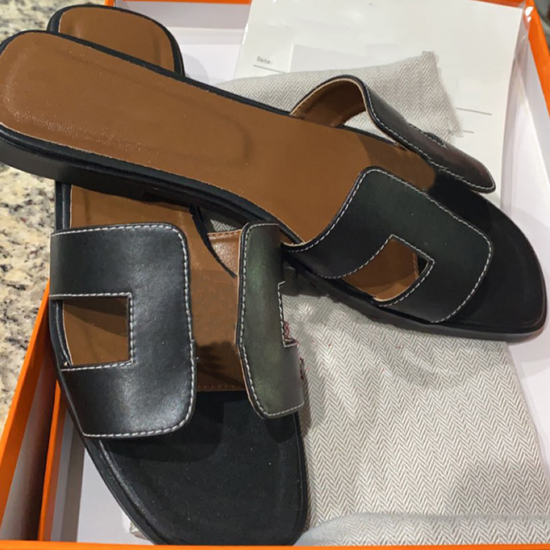 Women Oran Sandals Flats Slides Slippers Designer Sandal Box Calfskin Flat Flip Flops Black Leather Outdoor Beach Shoes Big size 278
Women Oran Sandals Flats Slides Slippers Designer Sandal Box Calfskin Flat Flip Flops Black Leather Outdoor Beach Shoes Big size 278