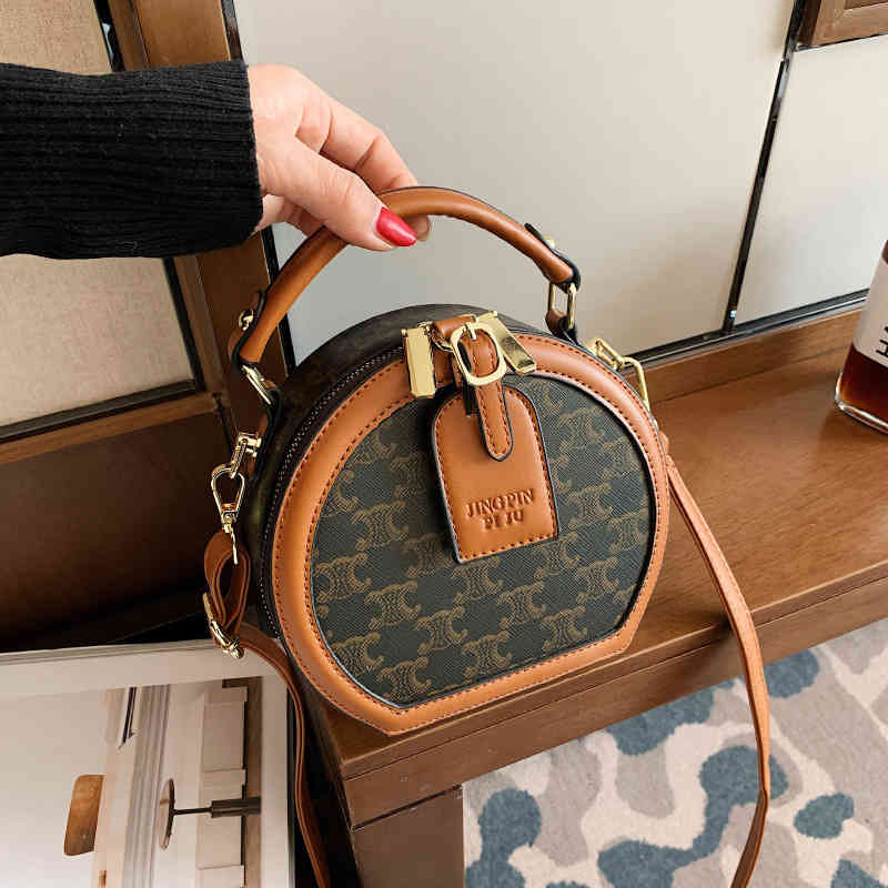 Women's small round new printing slant cross bags portable for women, Style 2 black
Women's small round new printing slant cross bags portable for women, Style 2 black