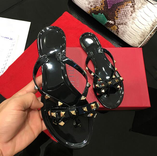 Fashion Woman Flip Flops Summer Shoes Cool Beach Rivets Big Bow Flat Sandals Brand Jelly Girls Size 35-42 Slippers
Fashion Woman Flip Flops Summer Shoes Cool Beach Rivets Big Bow Flat Sandals Brand Jelly Girls Size 35-42 Slippers