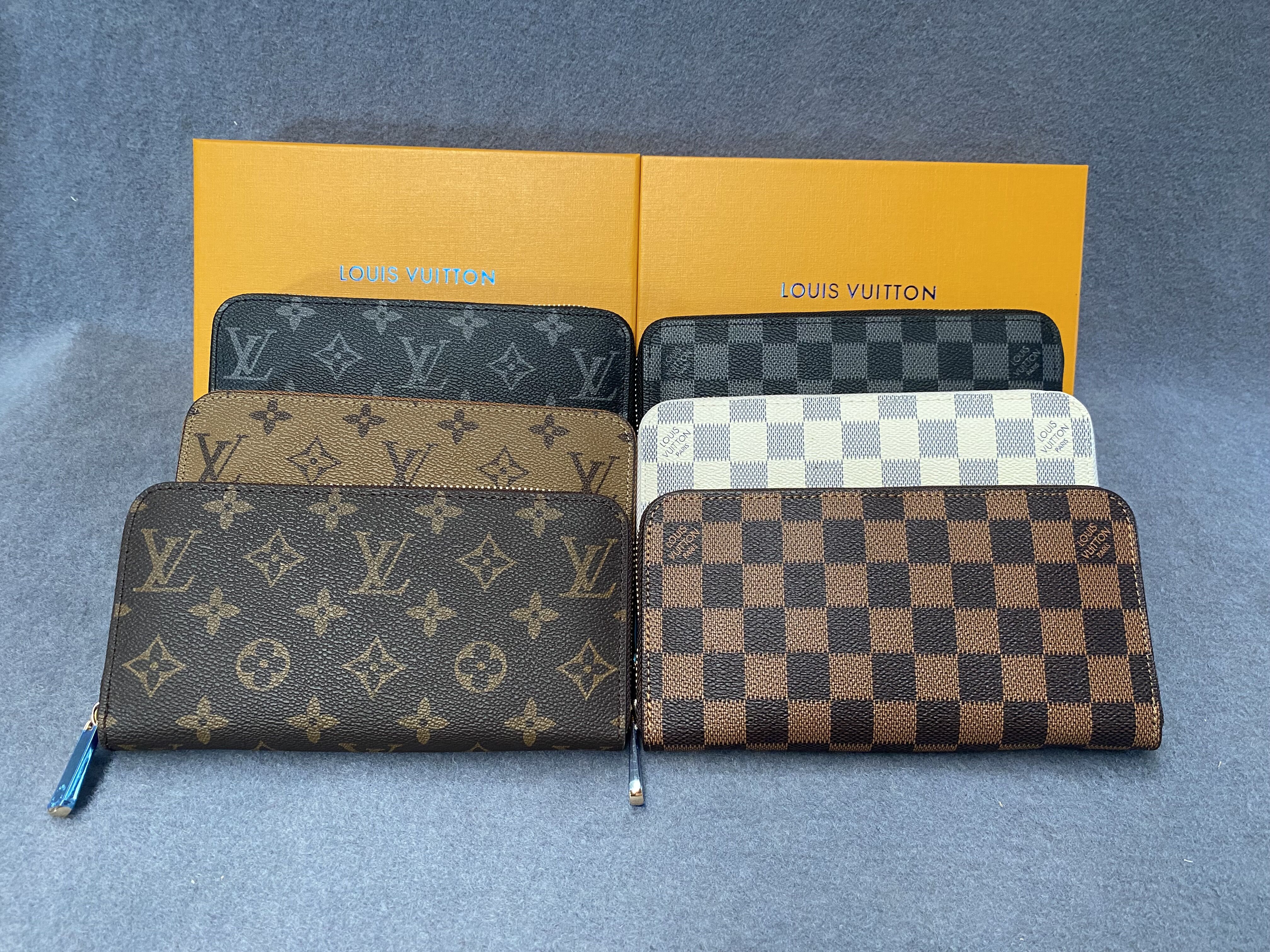 LOUIS VITTON LV Designers Leather Single Zipper Long Wallets Evening Bags Coin Purse Embossed Clutch Wallet With Box serial number 60017, Brown grid
LOUIS VITTON LV Designers Leather Single Zipper Long Wallets Evening Bags Coin Purse Embossed Clutch Wallet With Box serial number 60017, Brown grid