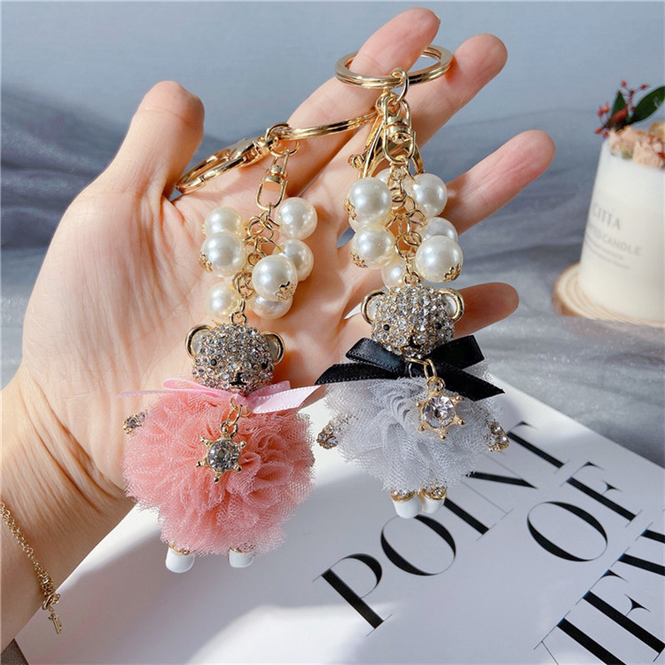 creative pearl string wedding dress bear key ring cute diamond inlaid doll car chain girl's heart bag pendant, Silver
creative pearl string wedding dress bear key ring cute diamond inlaid doll car chain girl's heart bag pendant, Silver