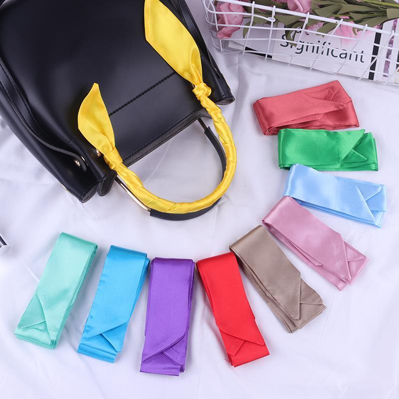 Scarves Korean Solid Color Slender Thin Long Narrow Ribbon Silk Scarf Tied Bag Handle Women Summer Satin Multifunction Headband Q23
Scarves Korean Solid Color Slender Thin Long Narrow Ribbon Silk Scarf Tied Bag Handle Women Summer Satin Multifunction Headband Q23