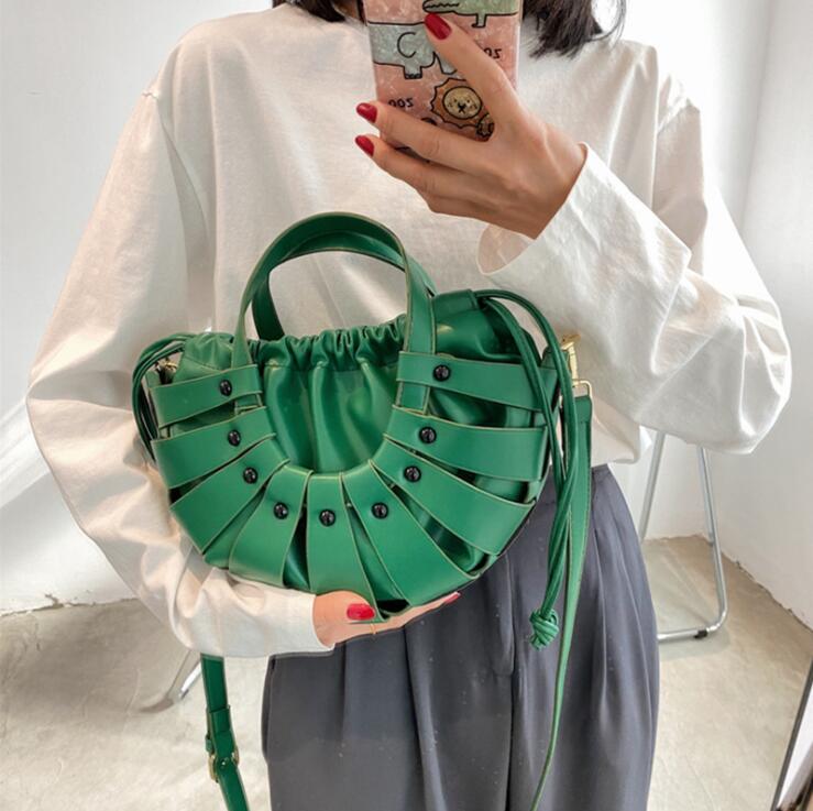wholesal women handbag summer striped hollow bags personalized rivets womens messenger bag street trend solid color leather fashion handbags
wholesal women handbag summer striped hollow bags personalized rivets womens messenger bag street trend solid color leather fashion handbags