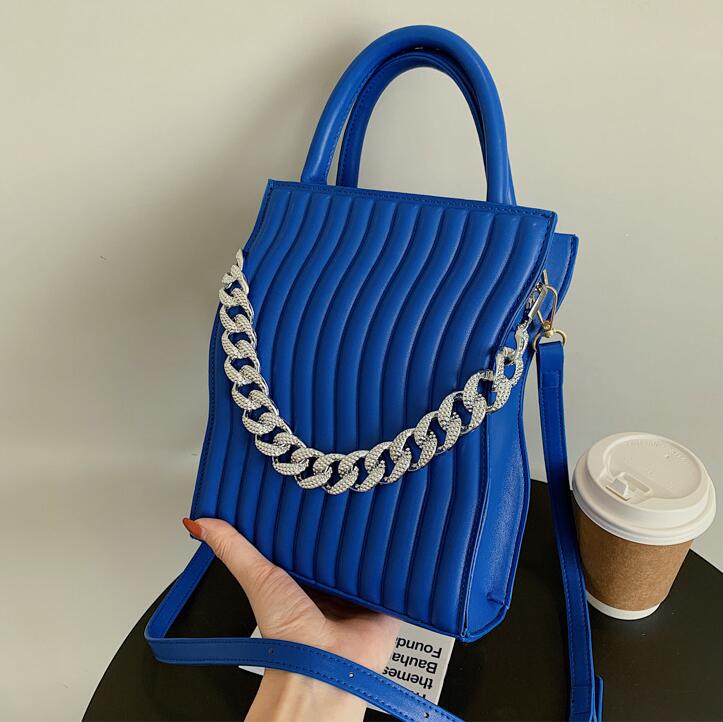 Wholesale ladies leather shoulder bags sweet candy-colored vertical fashion handbag street trend diamond chain bag simple personalized embossed striped backpack, Blue9613
Wholesale ladies leather shoulder bags sweet candy-colored vertical fashion handbag street trend diamond chain bag simple personalized embossed striped backpack, Blue9613