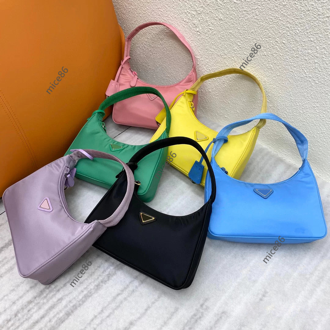 Top quality Women's tote Nylon leather Bag Luxurys Designers woemns men Crossbody Shoulder Wallet free handbags bags Purses duffle Hobo pink hangbag, Box
Top quality Women's tote Nylon leather Bag Luxurys Designers woemns men Crossbody Shoulder Wallet free handbags bags Purses duffle Hobo pink hangbag, Box