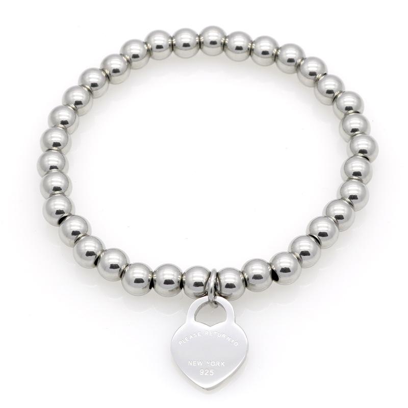 New Women Copper beaded bracelet Stainless PLEASE RETURN TO Heart charms T letter Pulsera Bracelet 1pcs drop ship, Golden;silver
New Women Copper beaded bracelet Stainless PLEASE RETURN TO Heart charms T letter Pulsera Bracelet 1pcs drop ship, Golden;silver