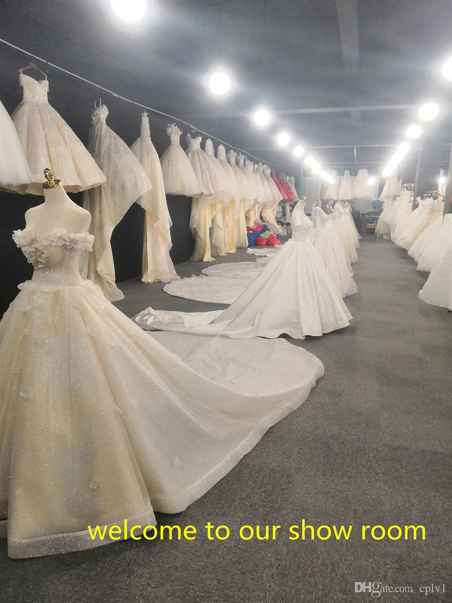 2021 A Line Bury Bridal Gowns Lace Gothic Muslim Wedding Dresses Short Sleeves with Wrap Tiered Skirts