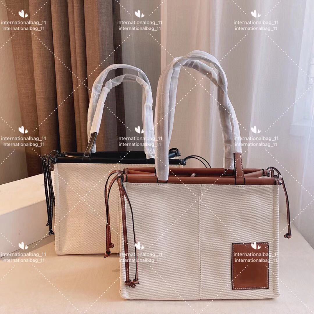 luxurys large capacity Top quality womens Beach Bags Pure color canvas Business Casual can be carried on one shoulder
luxurys large capacity Top quality womens Beach Bags Pure color canvas Business Casual can be carried on one shoulder