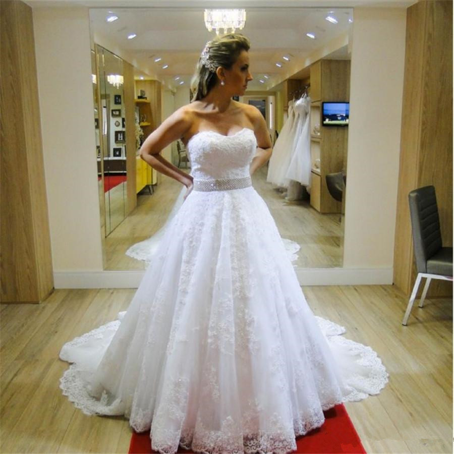 Sweetheart Tulle Wedding Dresses Beaded Sash Buttons Back Bridal Gowns Lace Applique Sweep Train Vestidos De Fiesta, Ivory
Sweetheart Tulle Wedding Dresses Beaded Sash Buttons Back Bridal Gowns Lace Applique Sweep Train Vestidos De Fiesta, Ivory