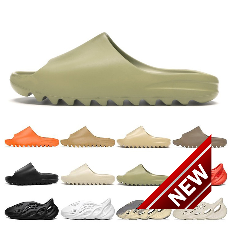 Sandals Kanye Slip-on Bone Slide Foam Men Women Slippers Enflame Orange Royal Blue Sandal Desert Sand Resin Moon Earth Brown Triple Suer bb
Sandals Kanye Slip-on Bone Slide Foam Men Women Slippers Enflame Orange Royal Blue Sandal Desert Sand Resin Moon Earth Brown Triple Suer bb