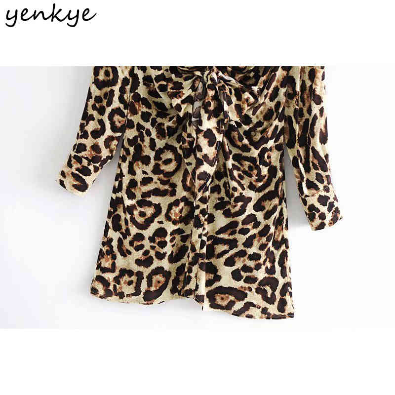 YENKYE Fashion Women Front knot Sexy Leopard Dress Female Lapel Collar Long Sleeve Casual Dress Spring Plus Size Mini Robe 210515