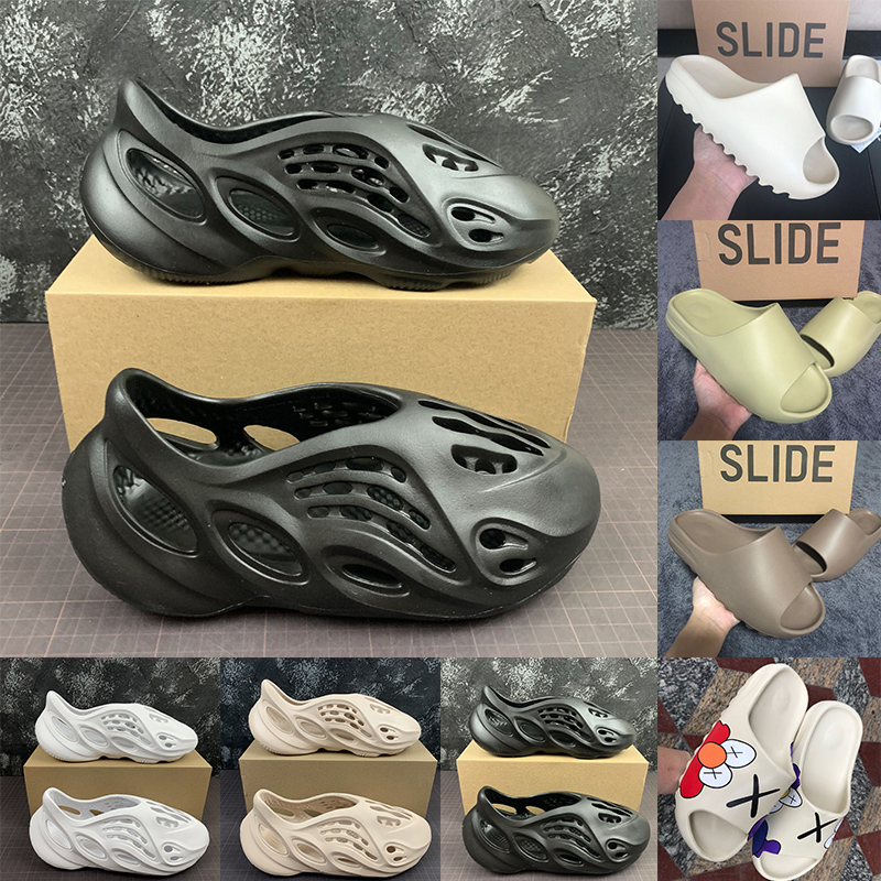 With Box Kanye West Slides Mens Beach Shoes Fashion Luxurys Designer Sandals For Men Women Foam Runner Resin Enflame Orange Sand Bone Pure Loafers Slippers
With Box Kanye West Slides Mens Beach Shoes Fashion Luxurys Designer Sandals For Men Women Foam Runner Resin Enflame Orange Sand Bone Pure Loafers Slippers