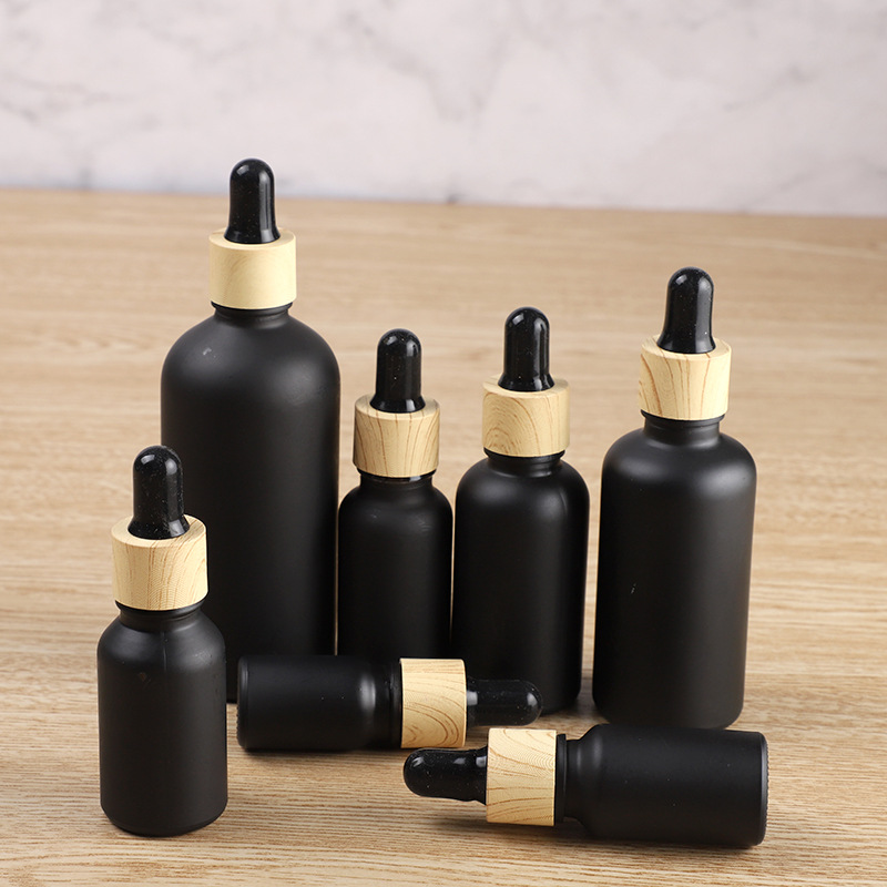Essential Oil Bottle Matte Black Glass e liquid Essential Oil Perfume Bottle with Reagent Pipette Dropper and Wood Grain Cap DHL Delivery
Essential Oil Bottle Matte Black Glass e liquid Essential Oil Perfume Bottle with Reagent Pipette Dropper and Wood Grain Cap DHL Delivery