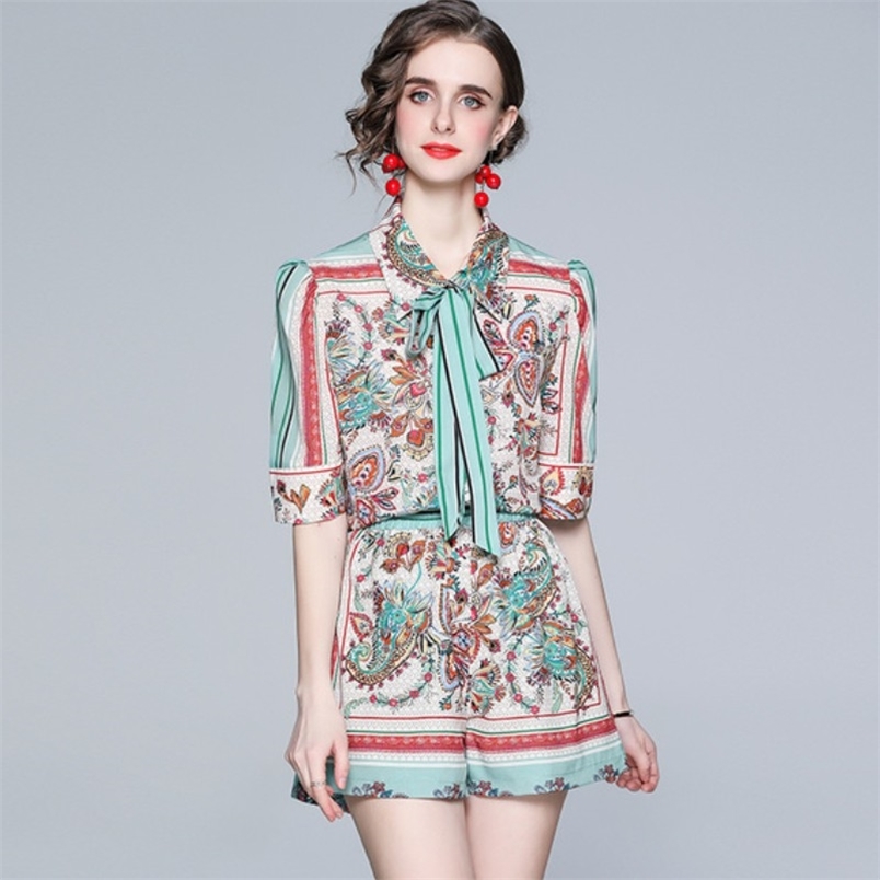 Fashion Summer Flower Print Two Piece Set Women Lapel Short Sleeve Bow Shirt Top + Wide Leg Shorts Suit 210519, Photo color
Fashion Summer Flower Print Two Piece Set Women Lapel Short Sleeve Bow Shirt Top + Wide Leg Shorts Suit 210519, Photo color