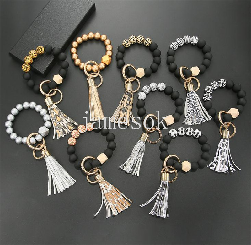 Black Frosted Wooden Bead Bracelet Keychain Fashion Pattern Tassel Pendant Bracelets Women Girl Key ring Wrist Strap 7 Colors DD255
Black Frosted Wooden Bead Bracelet Keychain Fashion Pattern Tassel Pendant Bracelets Women Girl Key ring Wrist Strap 7 Colors DD255