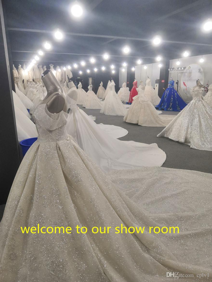 2021 A Line Bury Bridal Gowns Lace Gothic Muslim Wedding Dresses Short Sleeves with Wrap Tiered Skirts