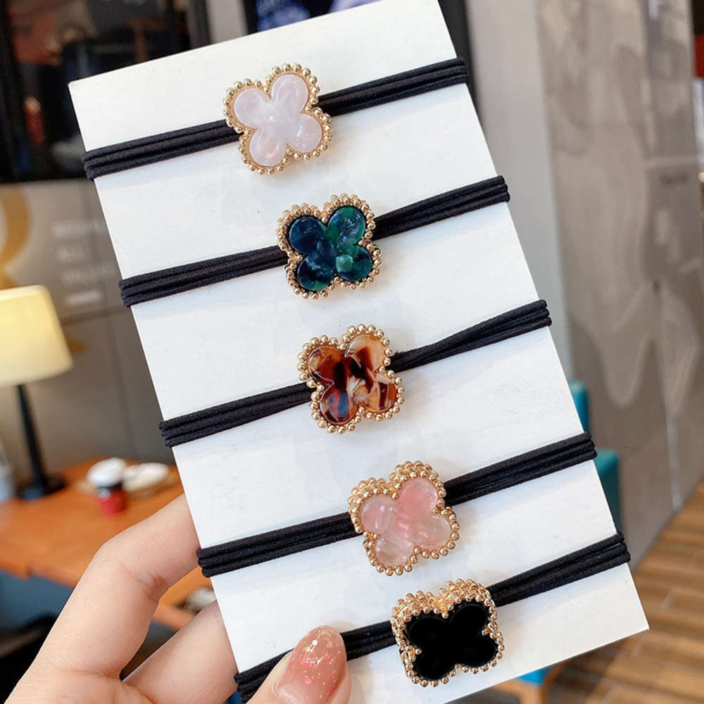 Tie rubber b girl Japan and South Korea fashion rope does not hurt hair can be used as bracelet with lucky clover head, White
Tie rubber b girl Japan and South Korea fashion rope does not hurt hair can be used as bracelet with lucky clover head, White