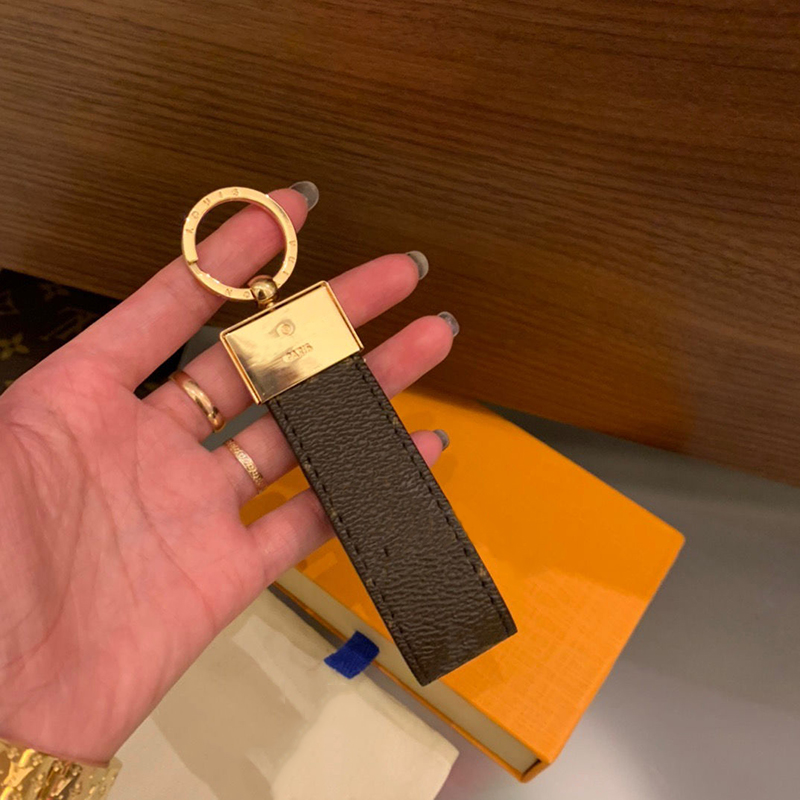 Fashion Brand Designer Keychain Luxurys Designers New Classic Leather Car Keychains Men Women Key Pendant Jewelry With Box D2111087Z, Silver
Fashion Brand Designer Keychain Luxurys Designers New Classic Leather Car Keychains Men Women Key Pendant Jewelry With Box D2111087Z, Silver