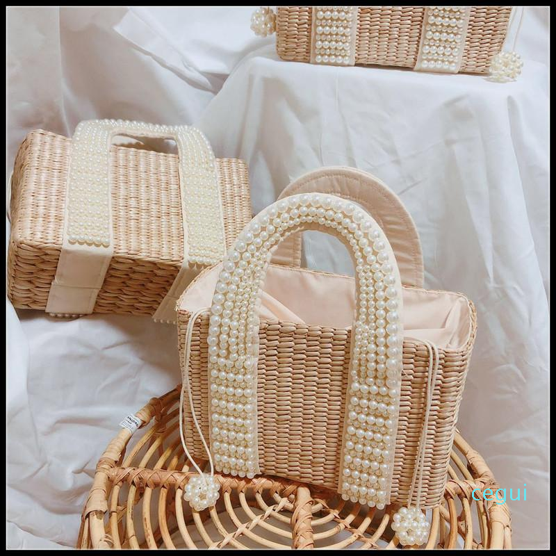 Fashion Pearls Handle Women Handbags Designer Beaded Straw Bags Luxury Pearl Rattan Totes Wicker Woven Large Summer Beach Purse C0326, Pearls chain ball
Fashion Pearls Handle Women Handbags Designer Beaded Straw Bags Luxury Pearl Rattan Totes Wicker Woven Large Summer Beach Purse C0326, Pearls chain ball
