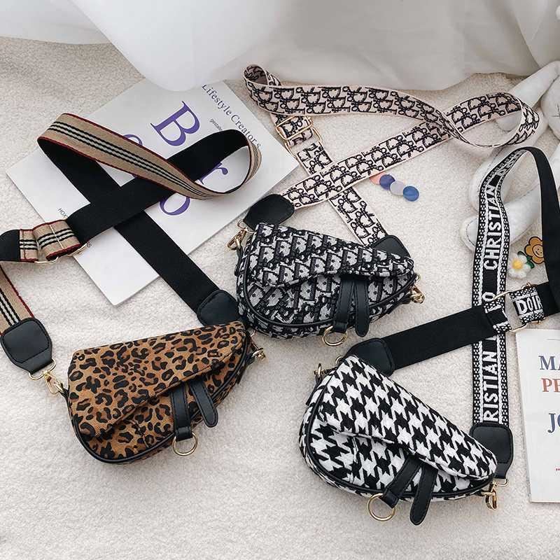 Designer Girls letter printed handbag fashion children stripe wide strap saddle Bag Kids leopard Plover case bust bags women mini purse A7640, Black
Designer Girls letter printed handbag fashion children stripe wide strap saddle Bag Kids leopard Plover case bust bags women mini purse A7640, Black