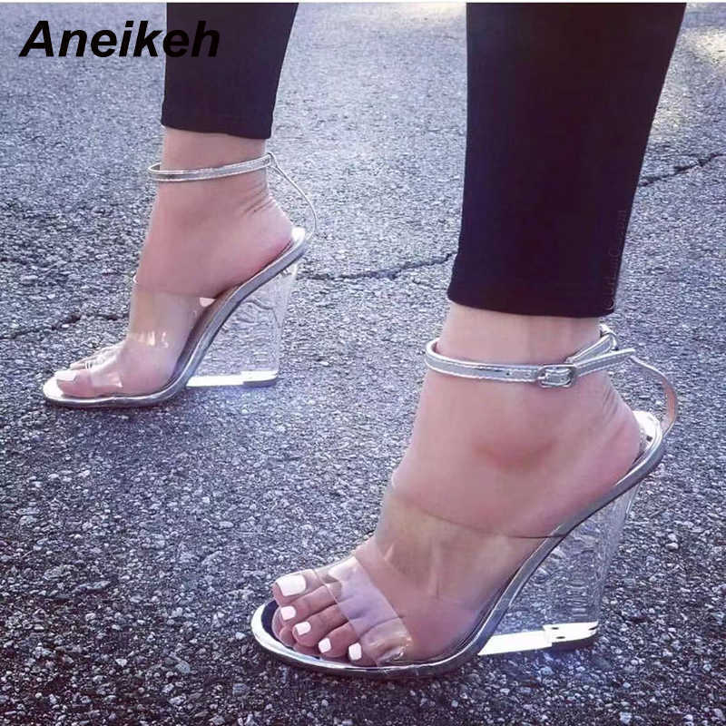 Aneikeh Fashion Silvery Women Shoes Peep Toe PVC Transparent Heel Wedges High Heels Sandals Summes Rome Strap Buckle Pumps 210615, Black
Aneikeh Fashion Silvery Women Shoes Peep Toe PVC Transparent Heel Wedges High Heels Sandals Summes Rome Strap Buckle Pumps 210615, Black