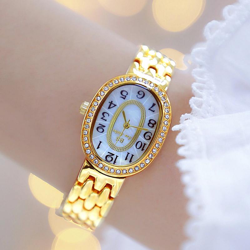 Wristwatches 2022 Unique Design Oval Classic Arabic Numeral Dial Diamond Watch For Women's Gold Stainless Steel Wrist Relogio Feminino
Wristwatches 2022 Unique Design Oval Classic Arabic Numeral Dial Diamond Watch For Women's Gold Stainless Steel Wrist Relogio Feminino