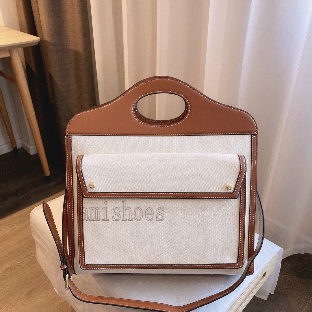 Mini Two Tone Canvas Signature Pocket Bag Italy Designer Denim Handbag Ladies Crossbody Classic Women Shoulder Clutch Carry Handle Bags Flap
Mini Two Tone Canvas Signature Pocket Bag Italy Designer Denim Handbag Ladies Crossbody Classic Women Shoulder Clutch Carry Handle Bags Flap
