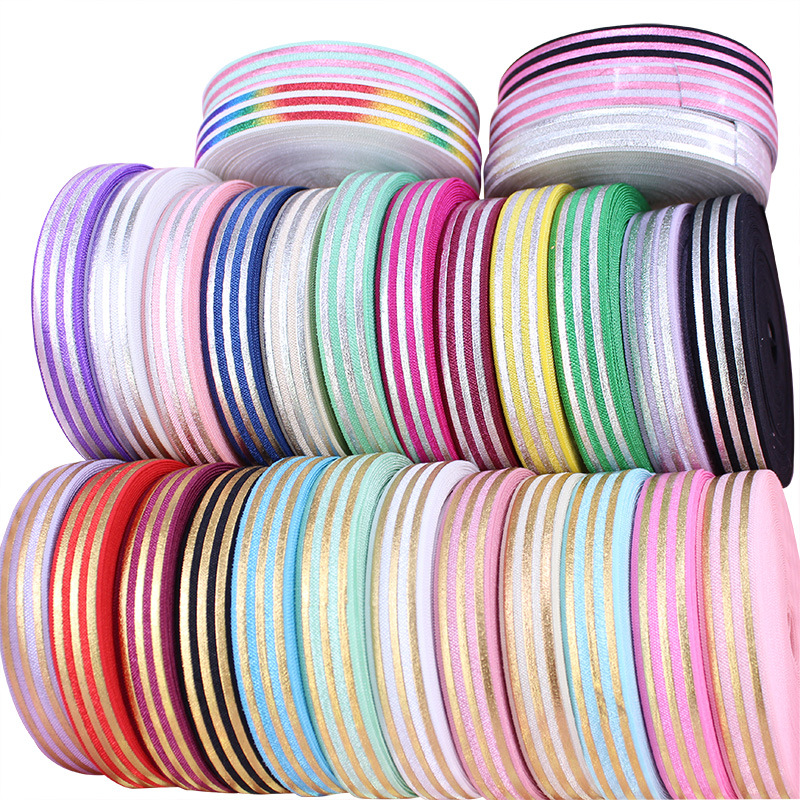 5/8" Gold foil silver foil pink foil FOE fold over elastic printed flower ribbon for DIY hair ties accessory welcome custom order. 
5/8" Gold foil silver foil pink foil FOE fold over elastic printed flower ribbon for DIY hair ties accessory welcome custom order.